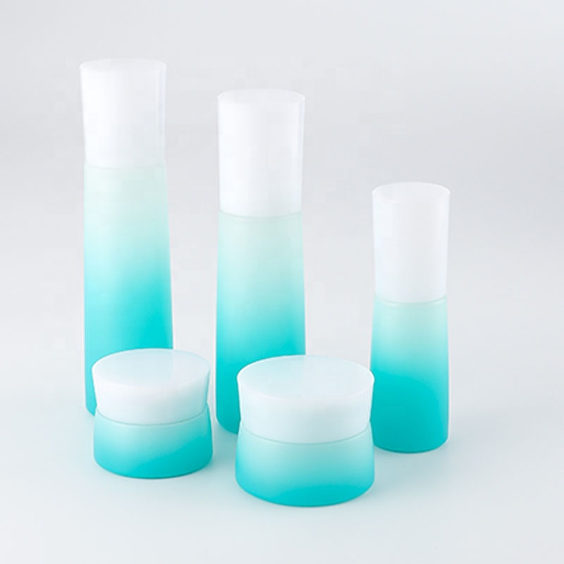 Cosmetic glass bottle set skincare cosmetic bottle packaging container manufacturer gradient ramp with pump&spray&screw cap