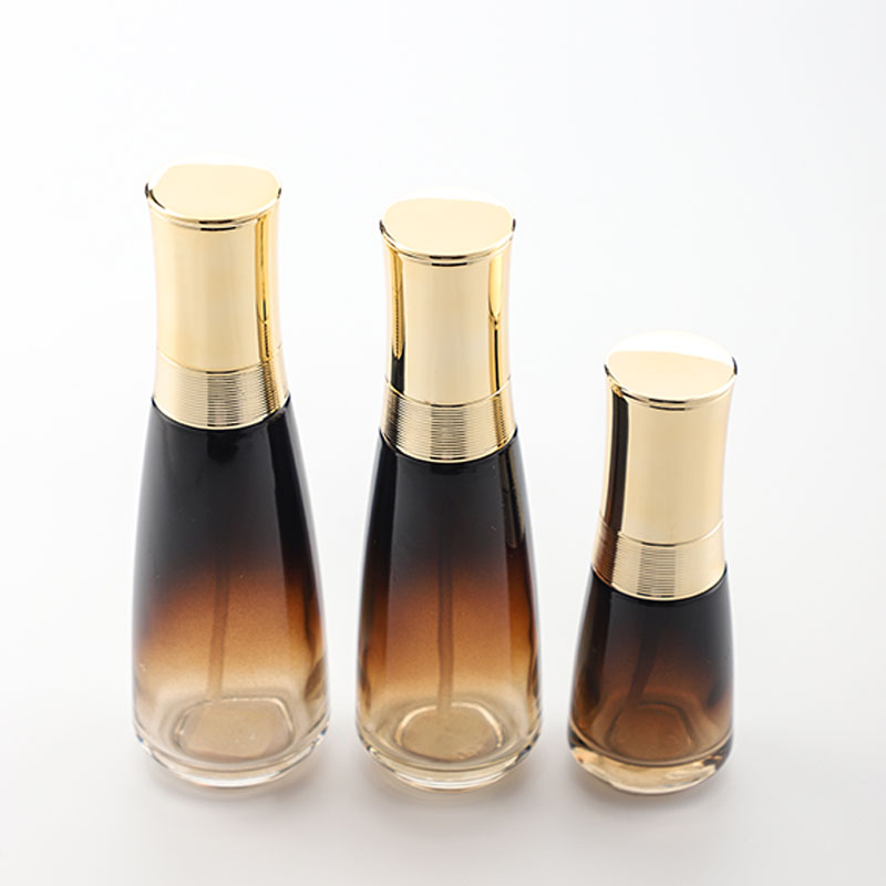 Cosmetic glass bottle set luxury skincare packaging container manufacturer new design with pump&spray&gold cap
