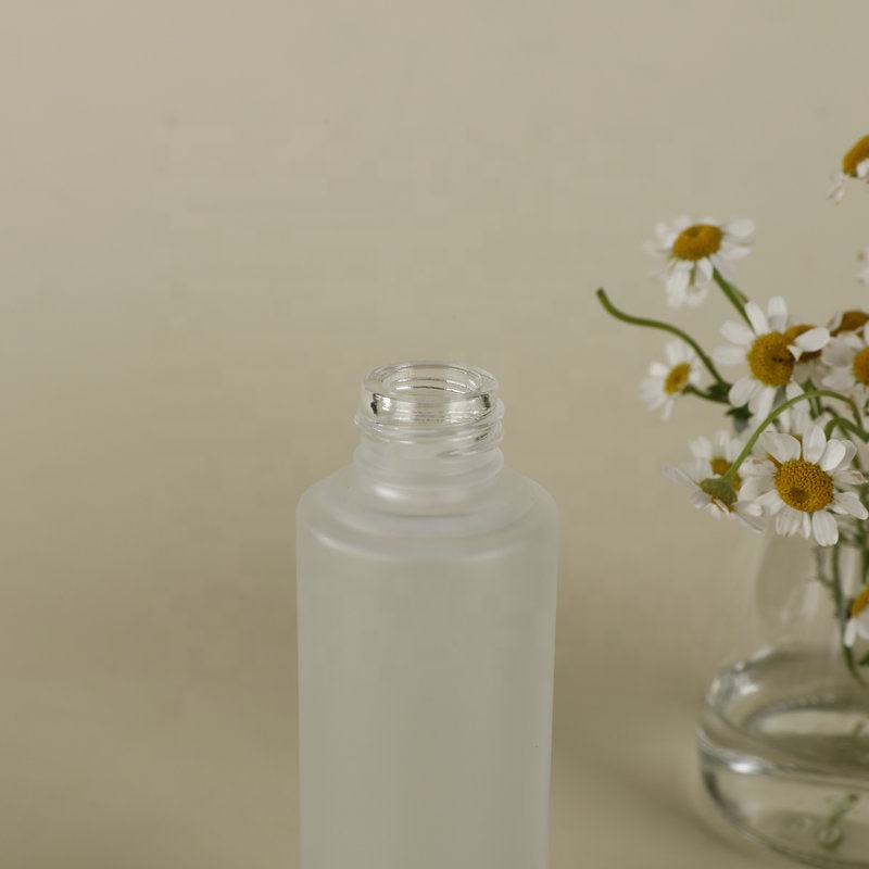 Cosmetic glass bottle set manufacture Lotion bottle Skincare packaging glass bottle container with white pump